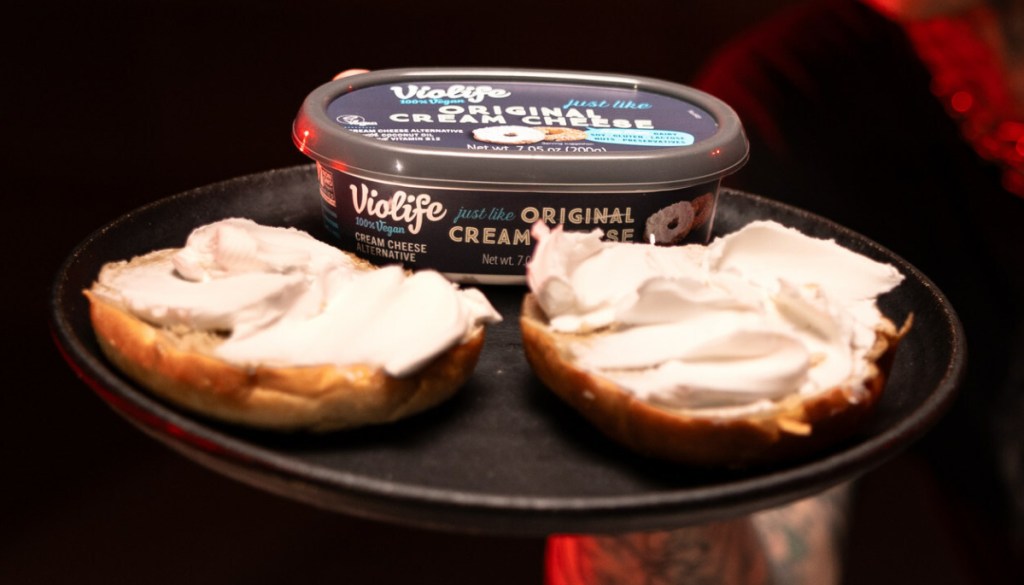 A plate of bagels with violife dairy free vegan cream cheese