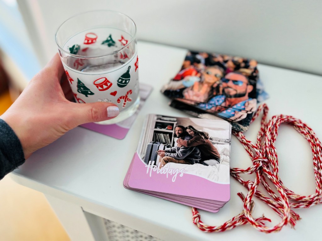 Photo Coasters on counter next to water glass