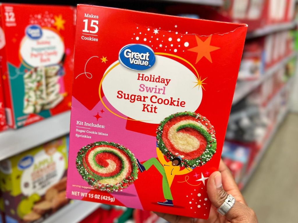 Hand holding up a box of Holiday Time Sugar Cookie Kit
