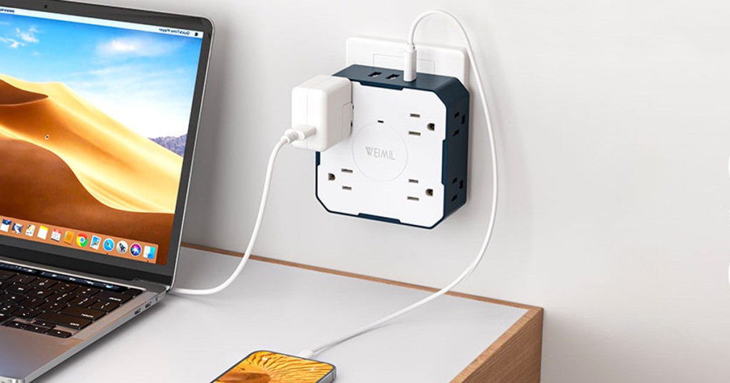 Weimil Wall Outlet Extender above a desk