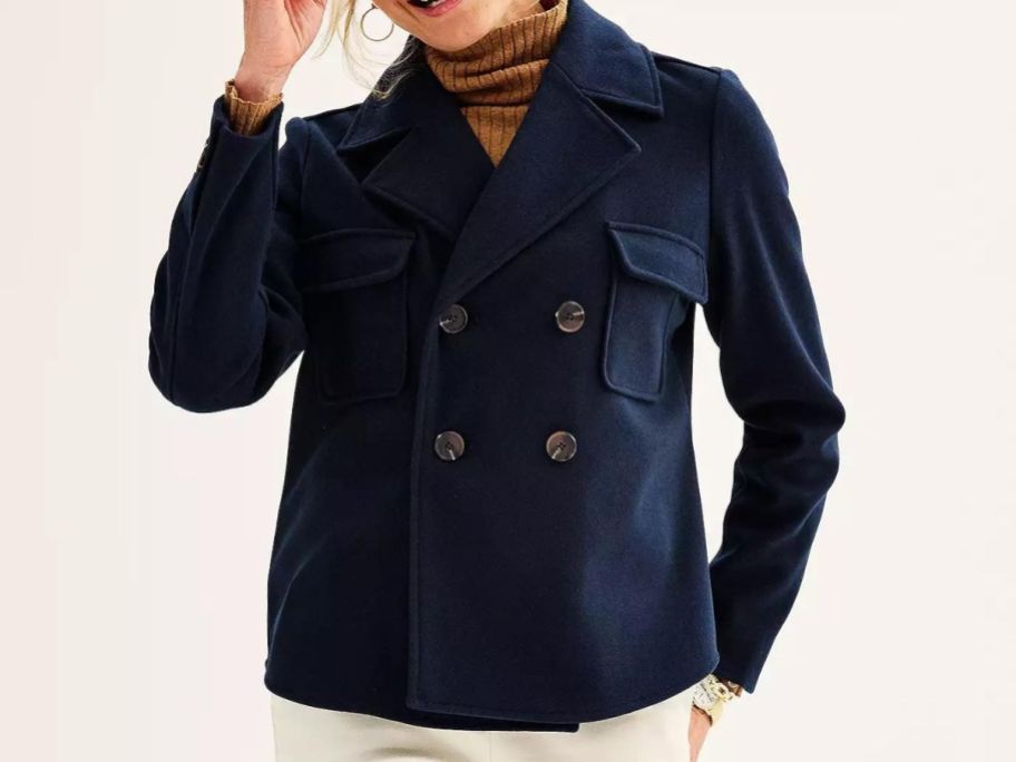 A woman wearing a Croft & Barrow Double Breasted Jacket in navy