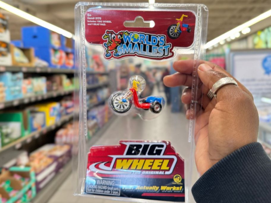 A hand holding World's Smallest Big Wheel