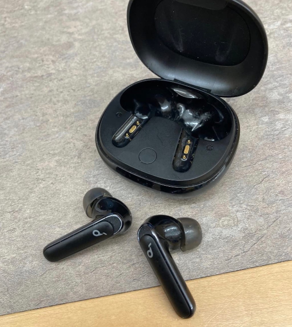 black anker earbuds on table