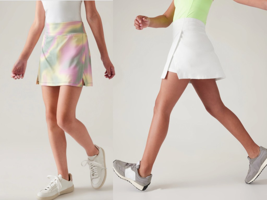 girls wearing rainbow and white skirts