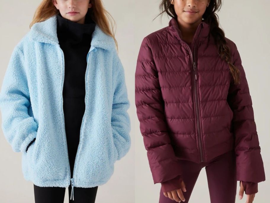 girl wearing a blue fleece coat and girl wearing a purple quilted style coat