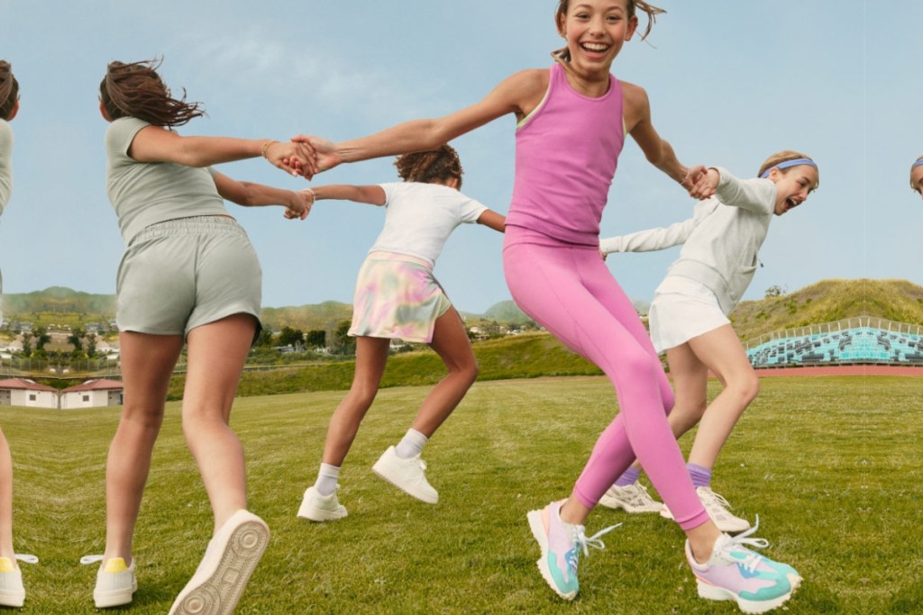 girls playing outside wearing athleta activewear