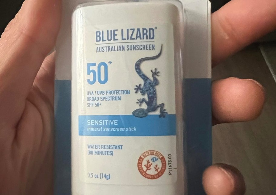 blue lizard sunscreen stick in persons hand-2