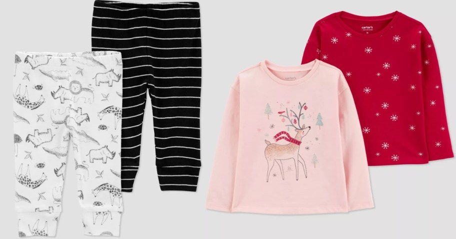 baby pants in white with black animals and black and white stripes, and 2 long sleeve tees with Christmas designs