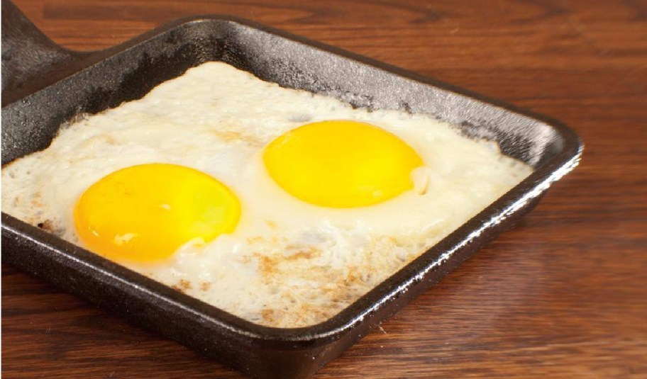 cast iron skillet with eggs displayed on it