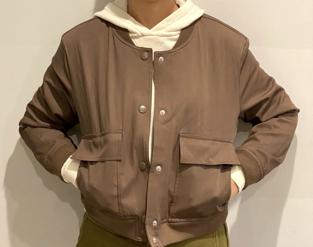 wearing brown cropped bomber jacket 