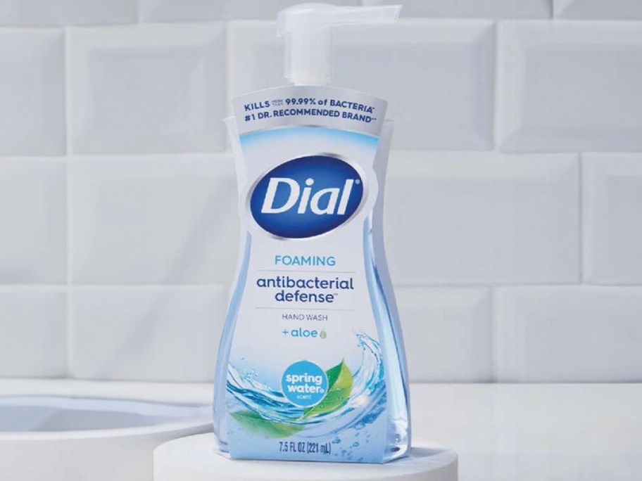 dial foaming hand wash bottle on table