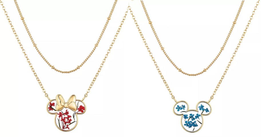 two gold layered mickey and minnie necklaces with dried flowers 