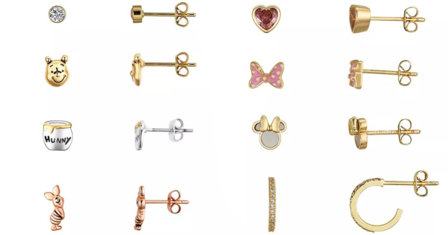 4 pairs of winnie the pooh and minnie mouse earrings stock images