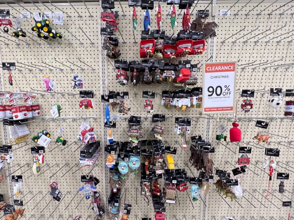 display of ornaments with a 90% off sign