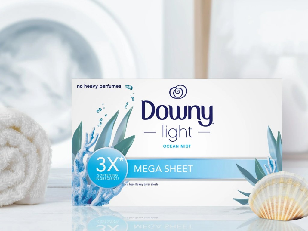 box of dryer sheets next to laundry