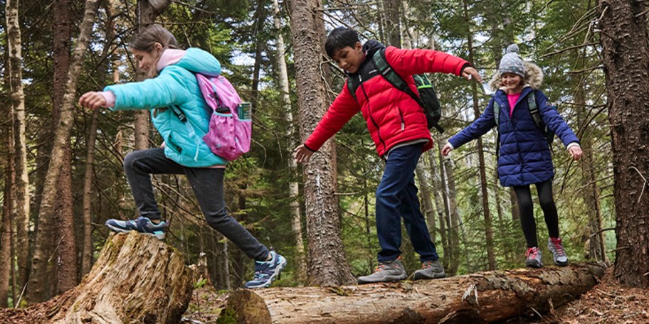 three kids wearing eddie bauer jackets