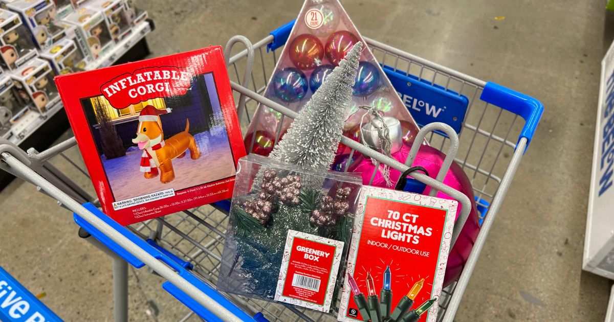  Shopping cart filled with item at five below in the christmas clearance section