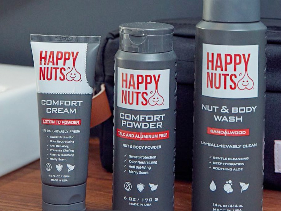 happy nuts cream, powder, and nut and body wash sitting on table