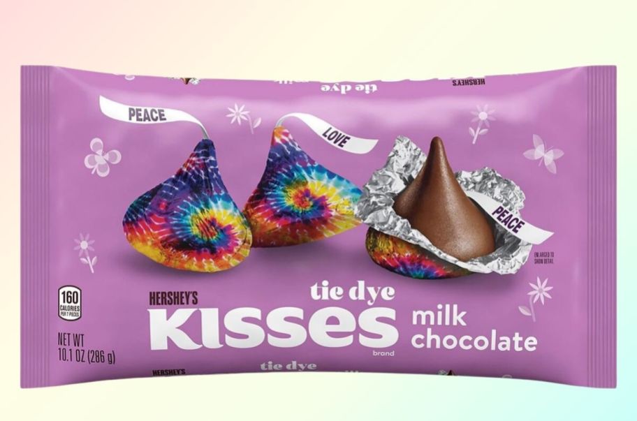 a bag of hersheys kisses with tie dyed foil wrappers