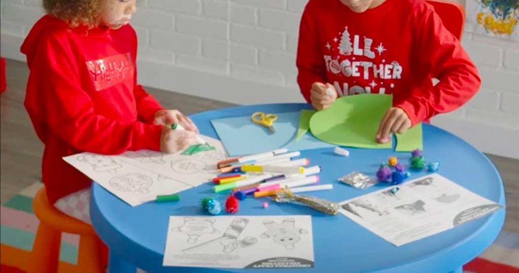kids playing with highlights christmas activity kit