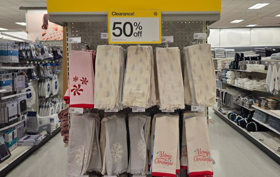 holiday dish towels on a store end cap