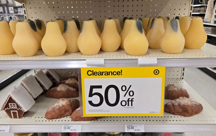 holiday shaped candles on a store end cap