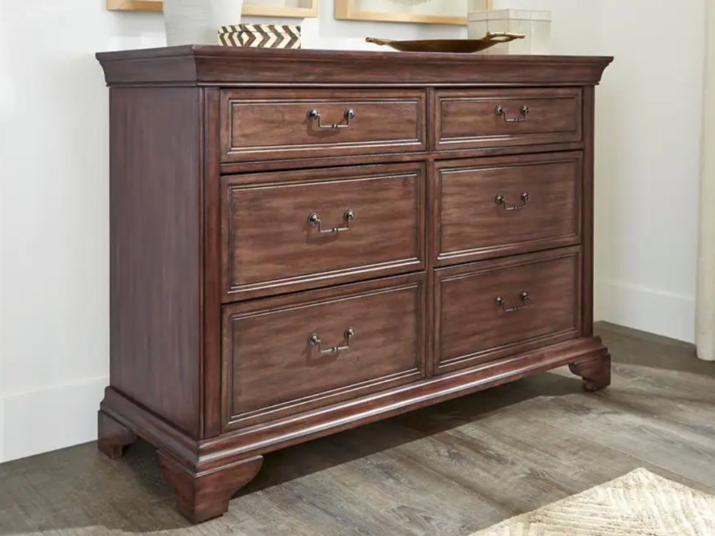 brown 6 drawer dresser in bedroom