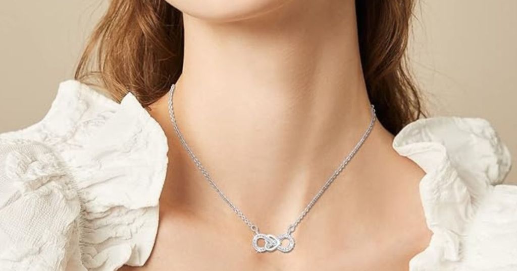 woman wearing an Infinity Heart Necklace