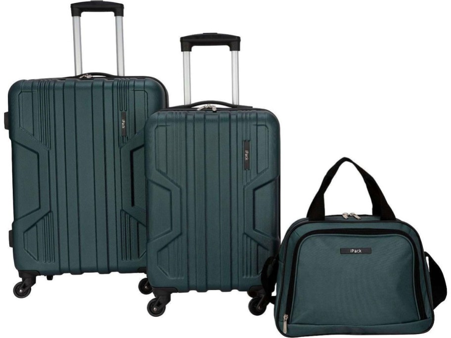 two green hardside spinner luggage pieces and matching bag stock image