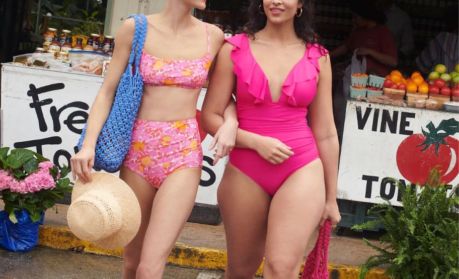 two womens at a farmers market wearing j crew swimwear