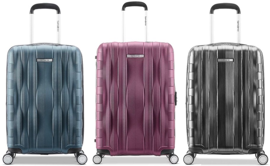 three blue, purple and gray samasonite hardside luggage