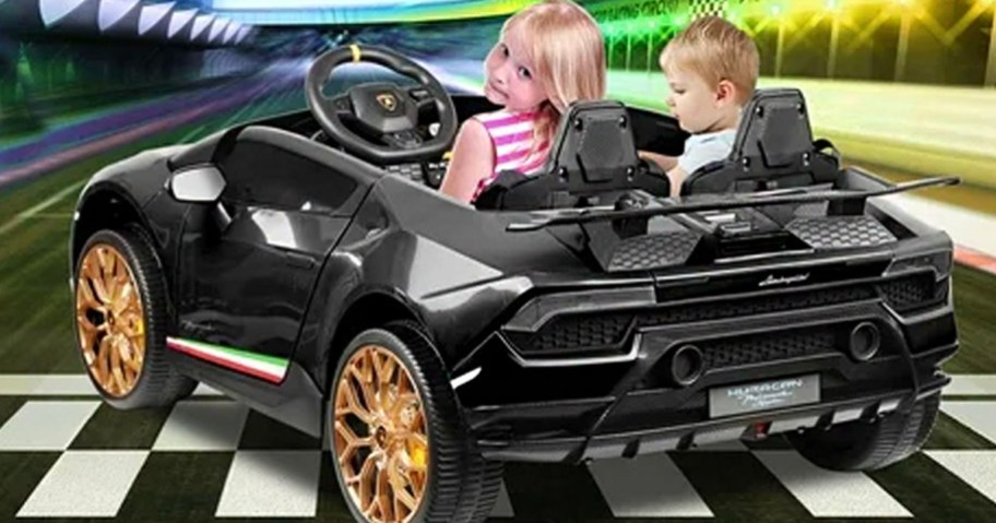 two kids driving in black lamborghini car