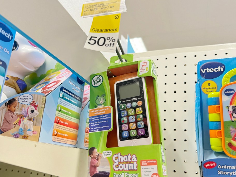 leap frog phone toy hanging on shelf