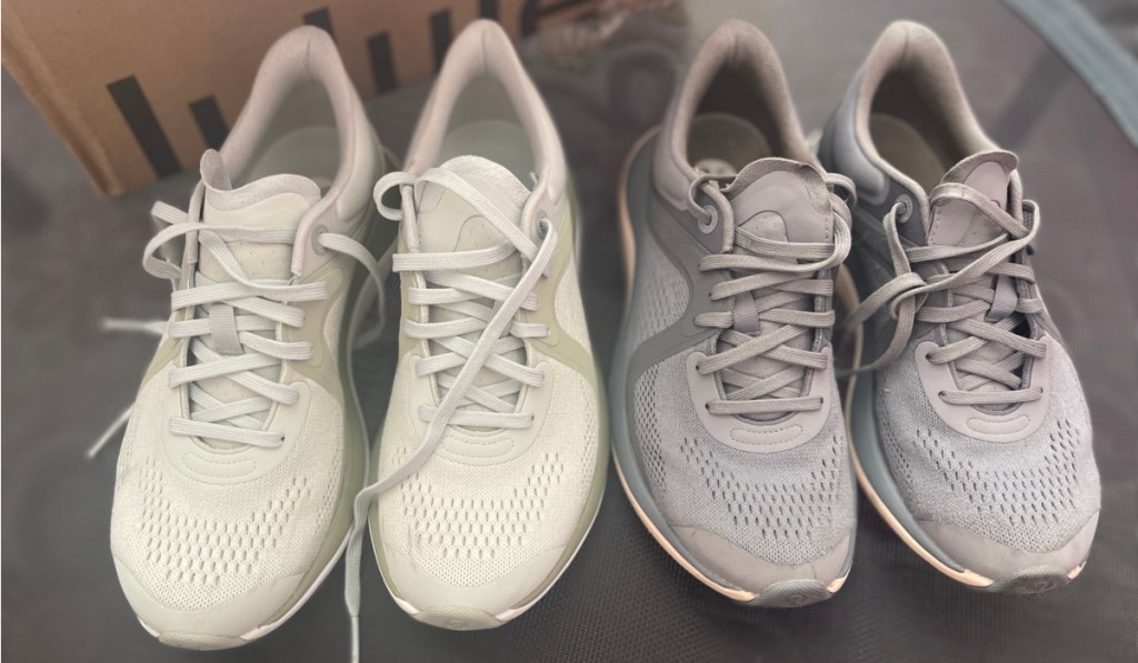 two pairs of running shoes side by side