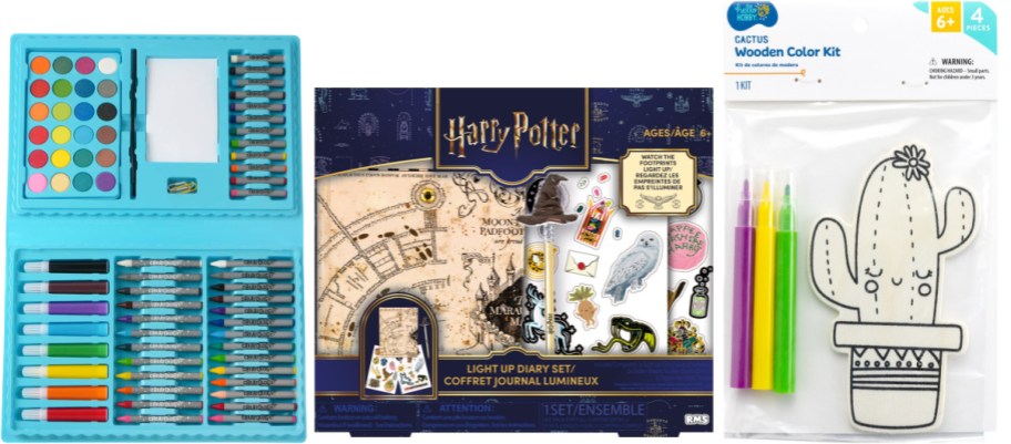 A Michaels art set, a Harry Potter map kit and a wooden cactus with markers set.
