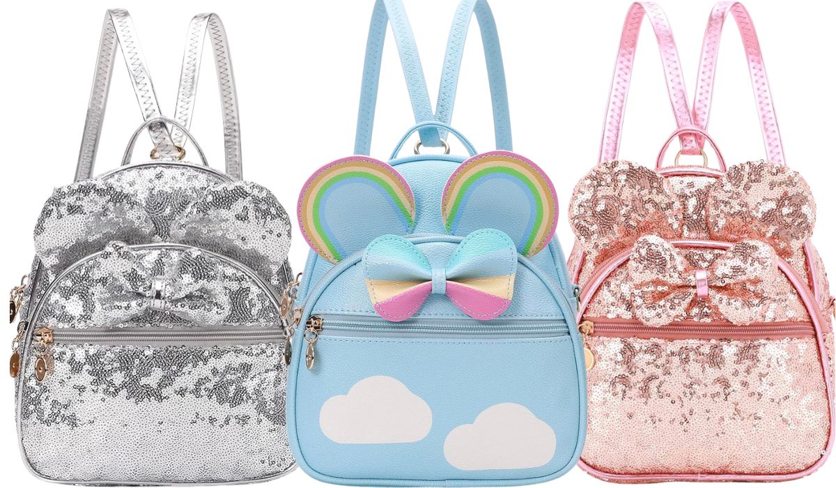 3 mini backpacks in silver sequined cloud and rainbow, and pink sequined stock images