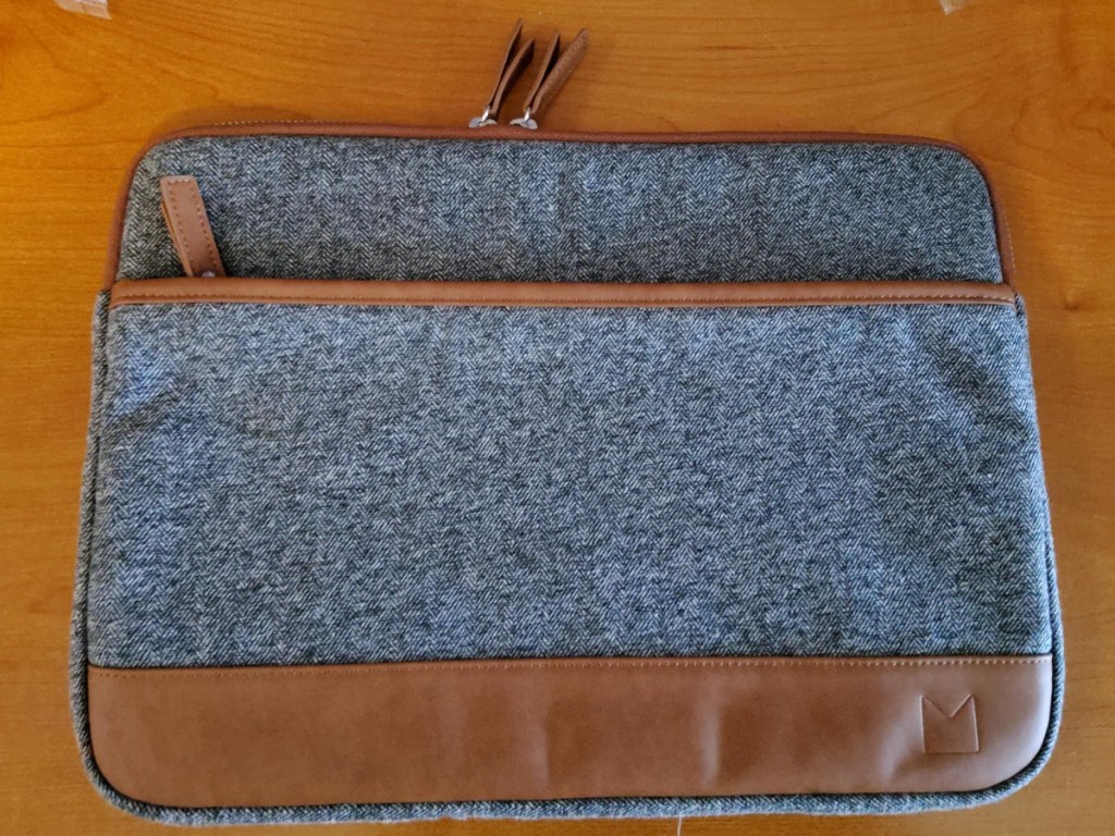 gray laptop sleeve with brown trim