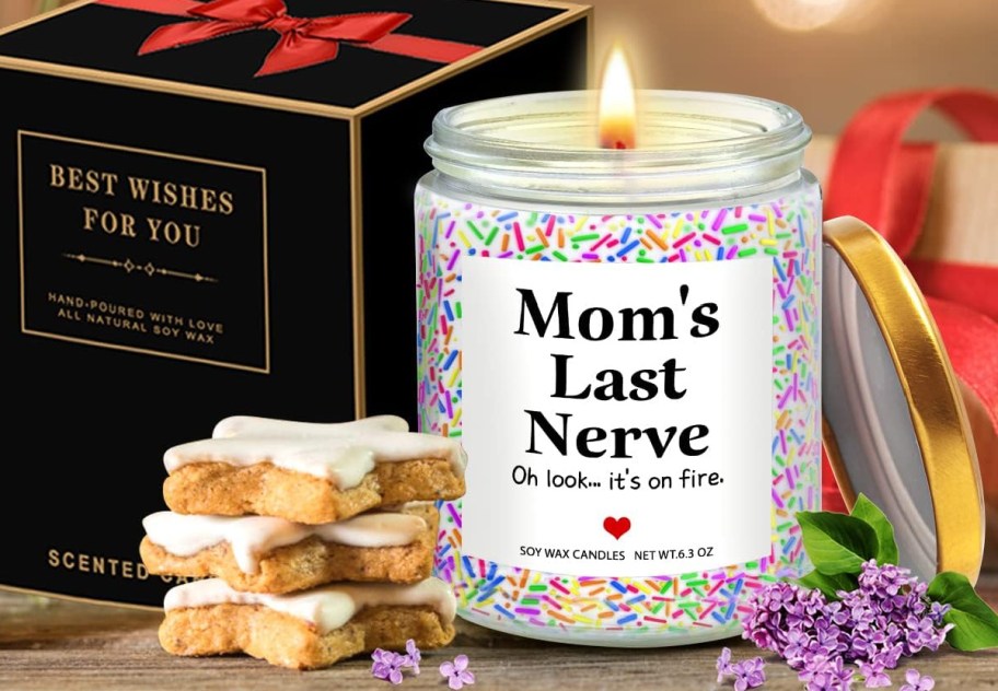 moms last nerve candle with gift next to him