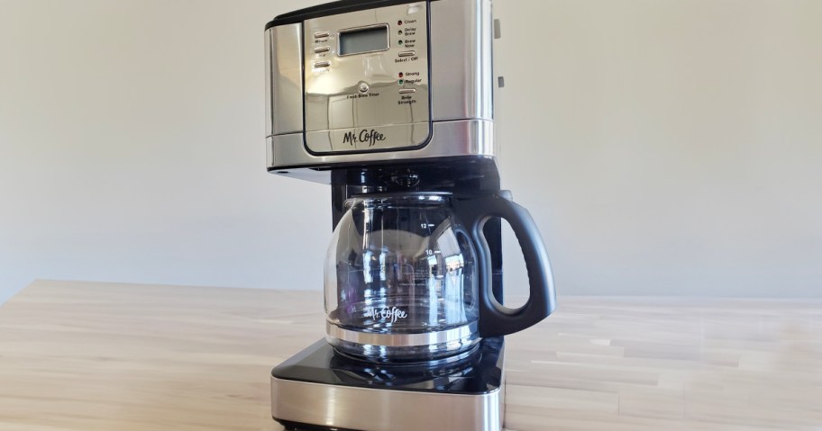 stainless steel mr coffee maker on table