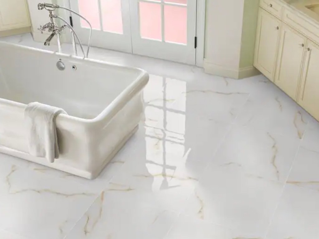 white tile in bathroom with white bathtub