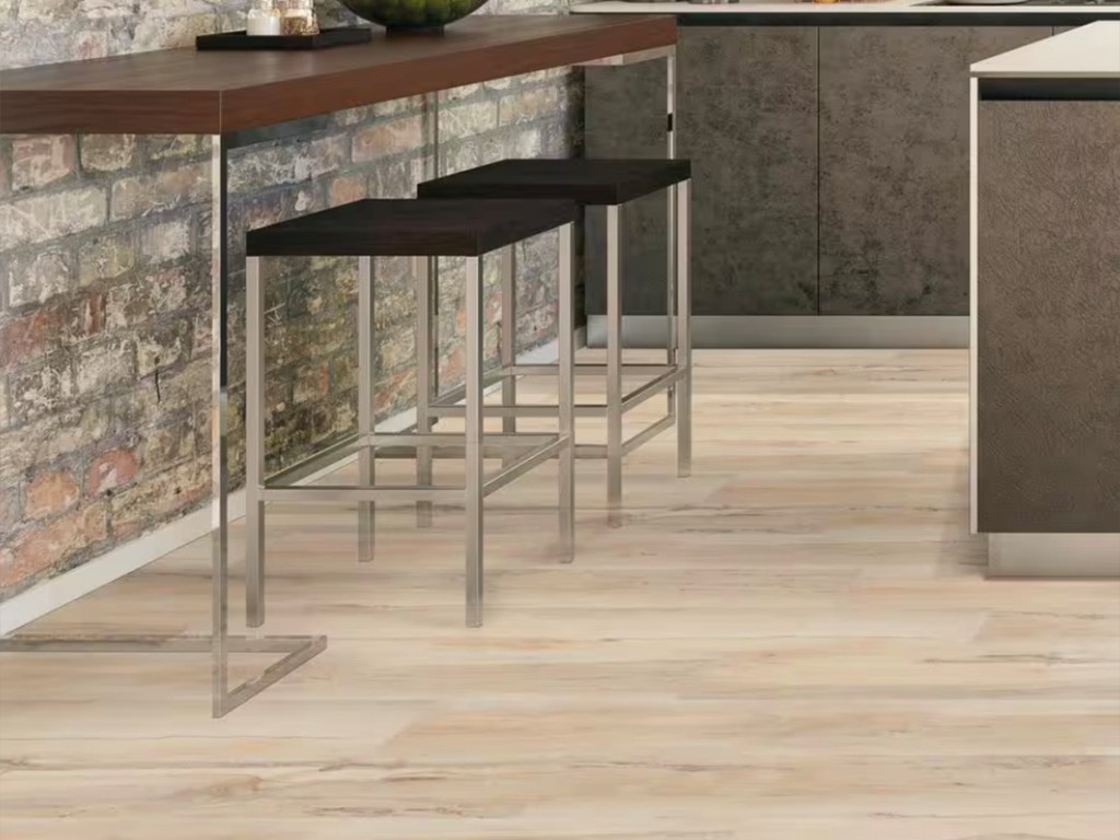 light brown hardwood plank flooring in kitchen
