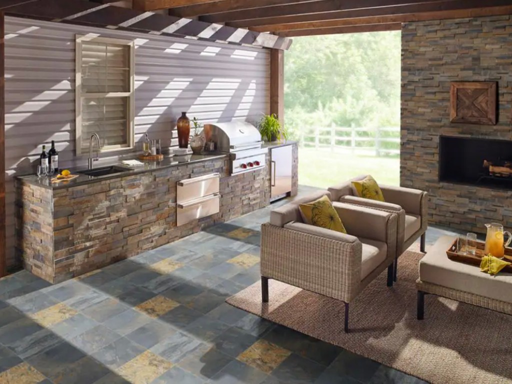 rustic tile flooring on patio with chairs and grill