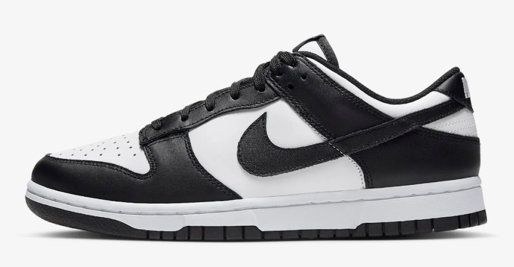 stock photo of black and white nike low dunk shoes