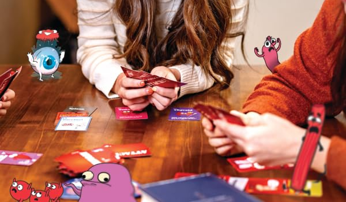 women playing the organ attack game