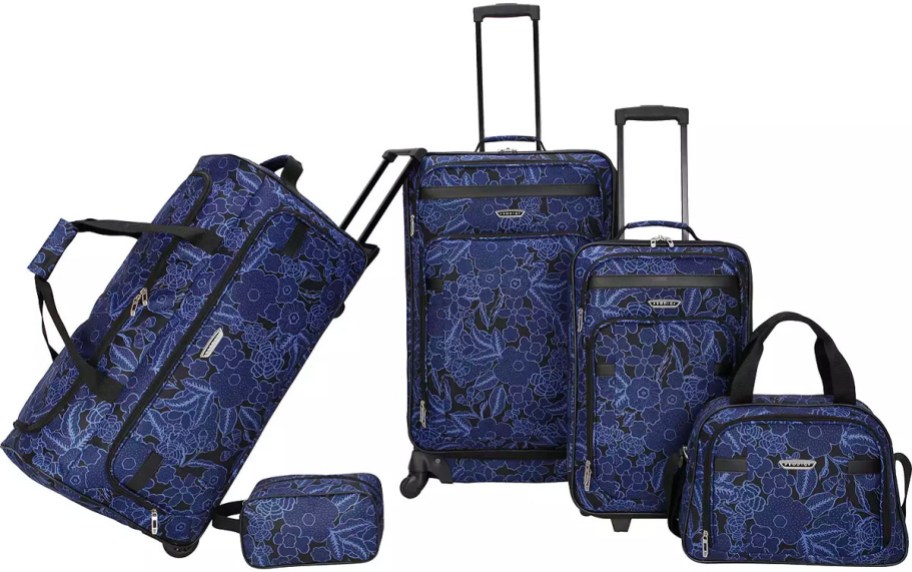 prodigy dark blue floral two spinners, duffle, computer bag, and cosmetics bag stock image