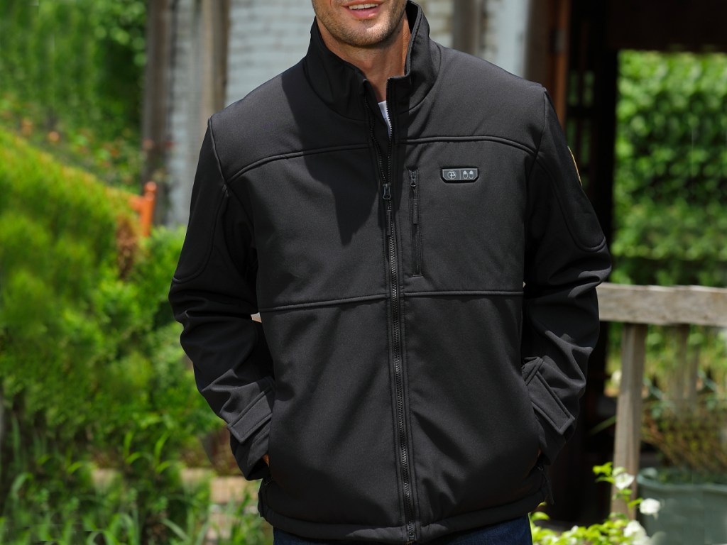 man wearing black heated jacket outdoors