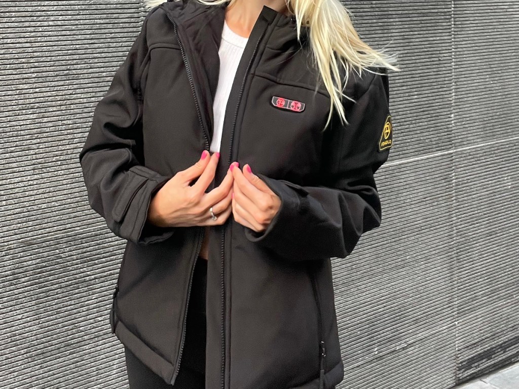 woman wearing black heated jacket