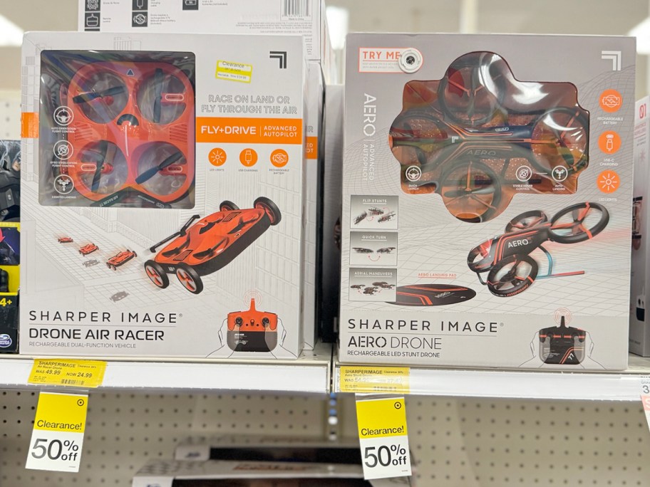 two drones sitting on shelf