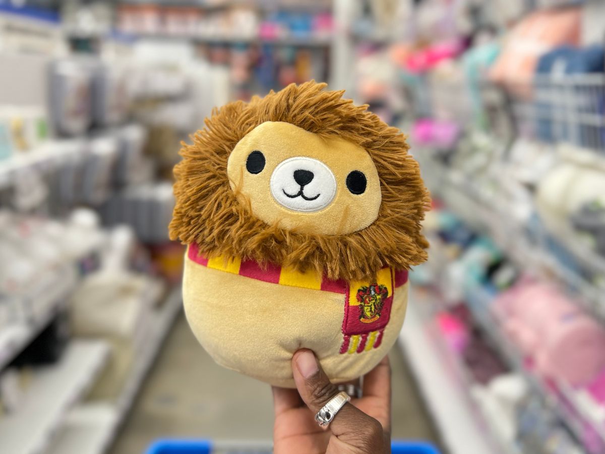 hand holding Harry Potter Squishmallow Gryffindor Lion