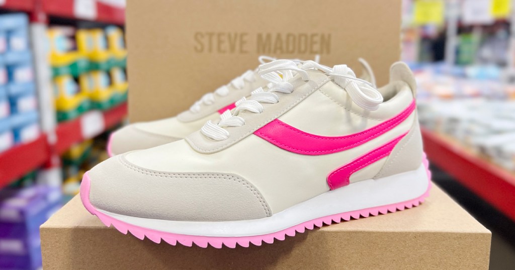 womens white and pink steve madden shoes sitting on box